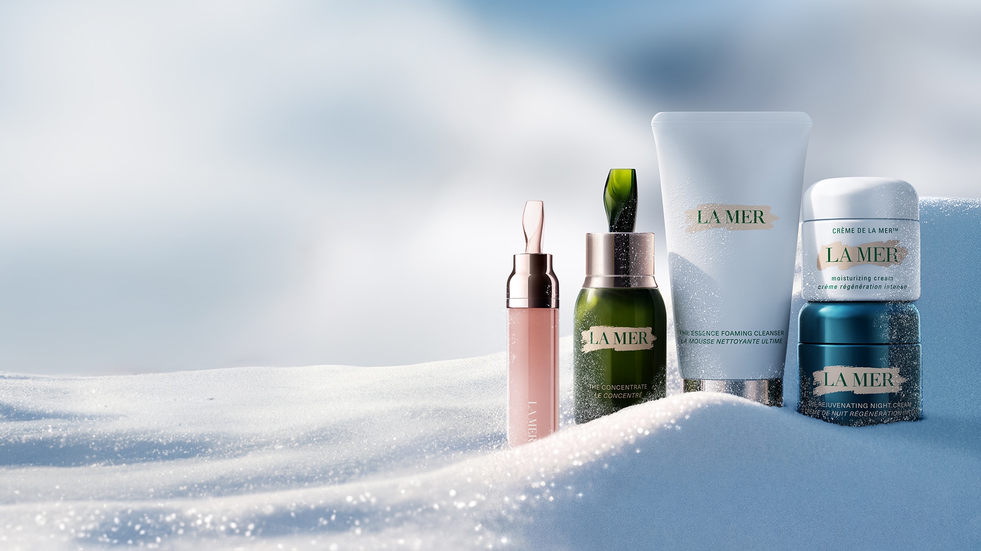 Selection of La Mer bestselling, nestled in snow, in an artic setting